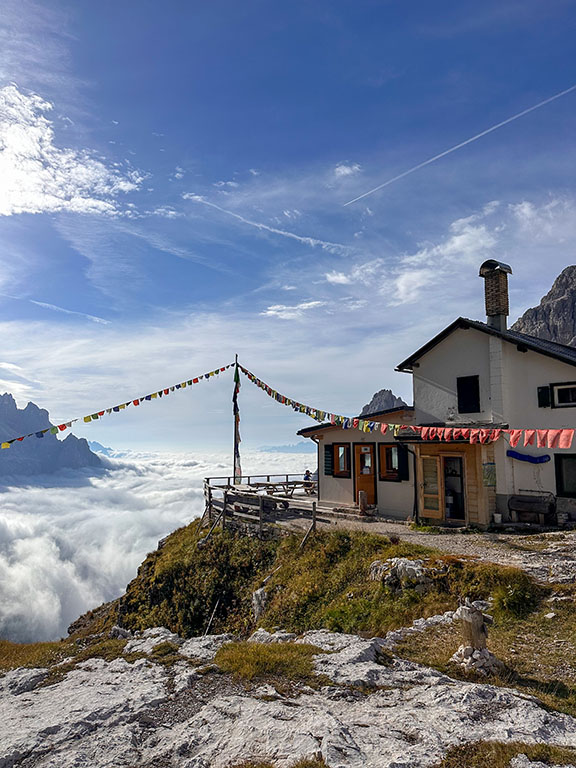 view clouds rifugio carducci dolomites italy hike via alta ferrata